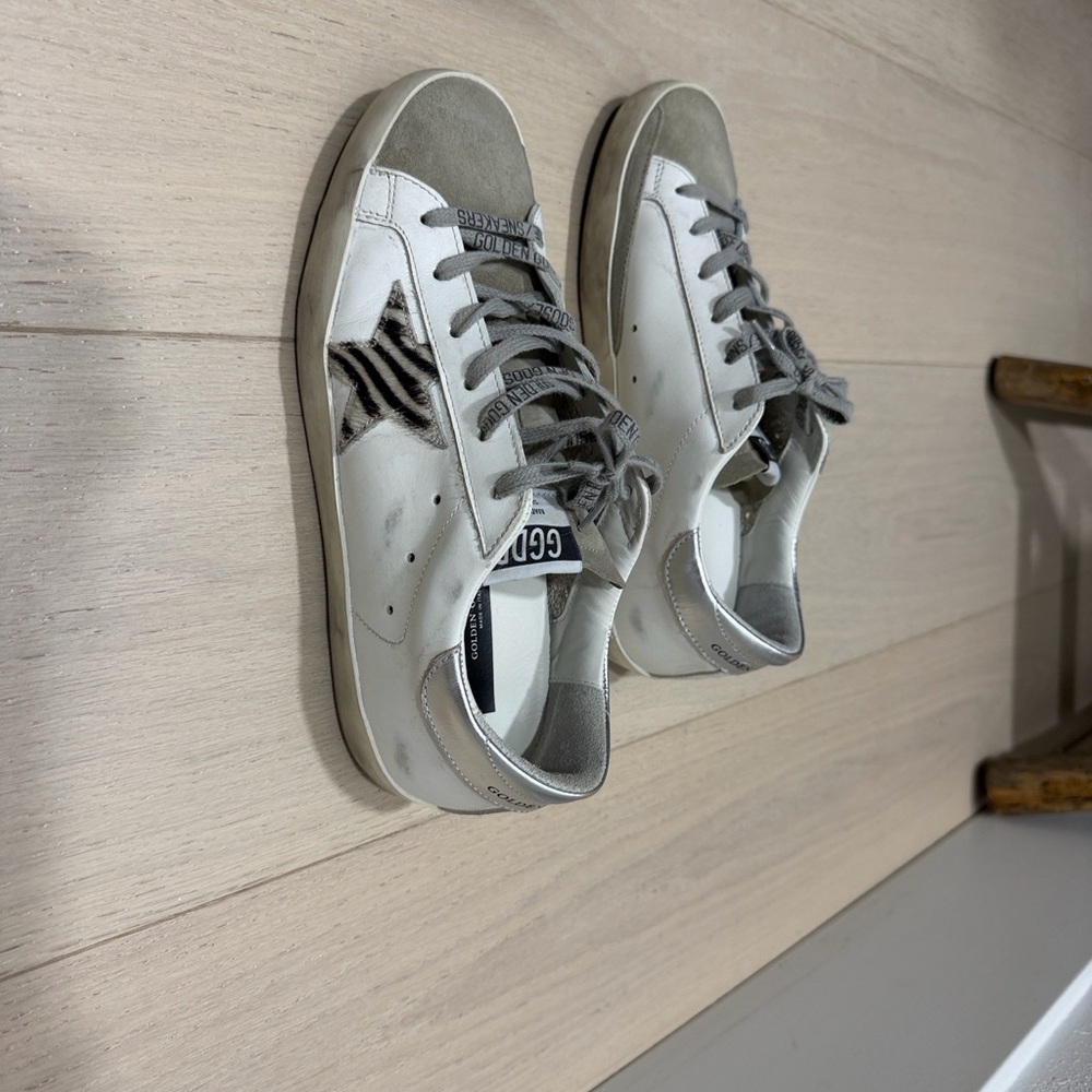 Golden Goose White and Gray Sneakers w/ beige & black striped fur star